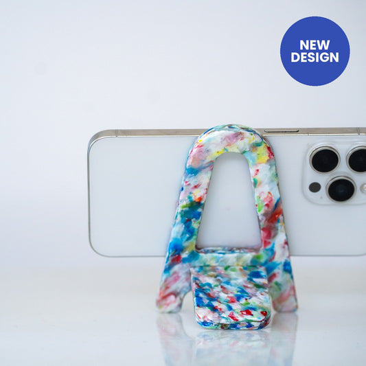 Tutti Frutti recycled phone stand holding a phone, new design