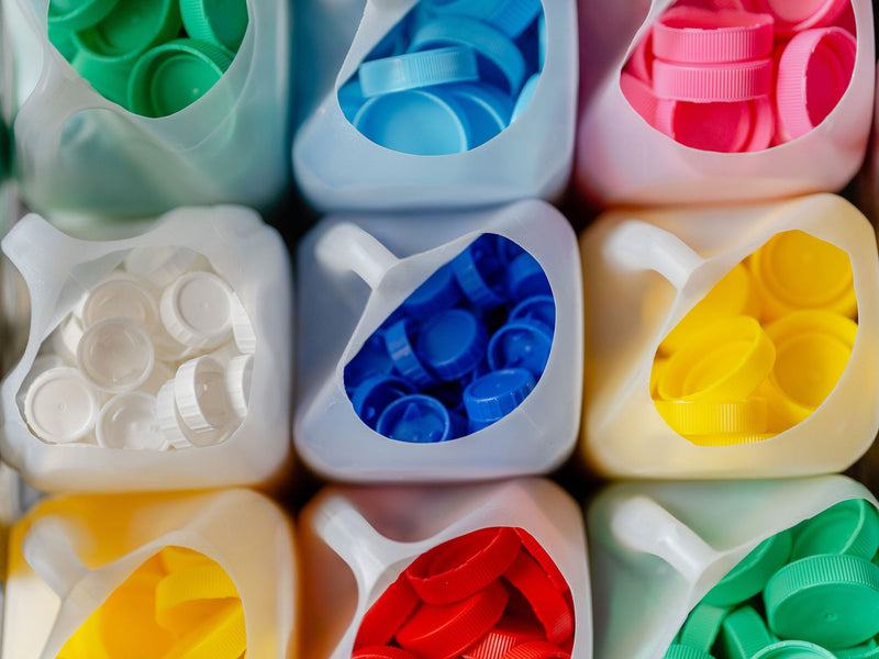 Bottle top lids sorted by colour at Banish HQ